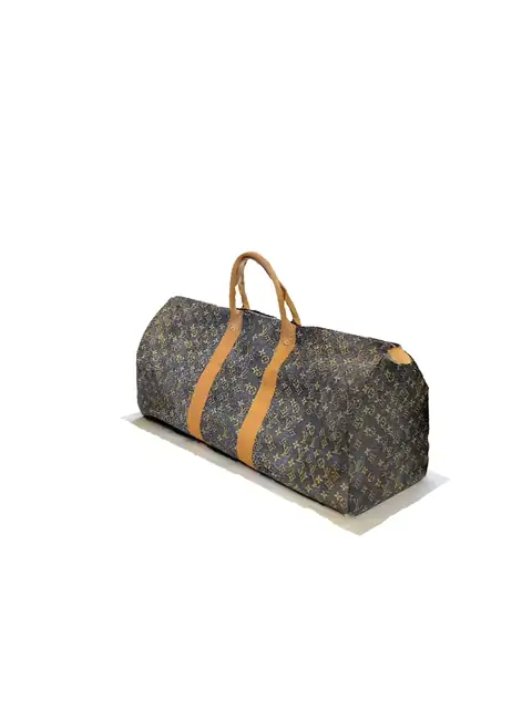 Rotating 3D scan of a life-size paper bag printed with a monogram pattern