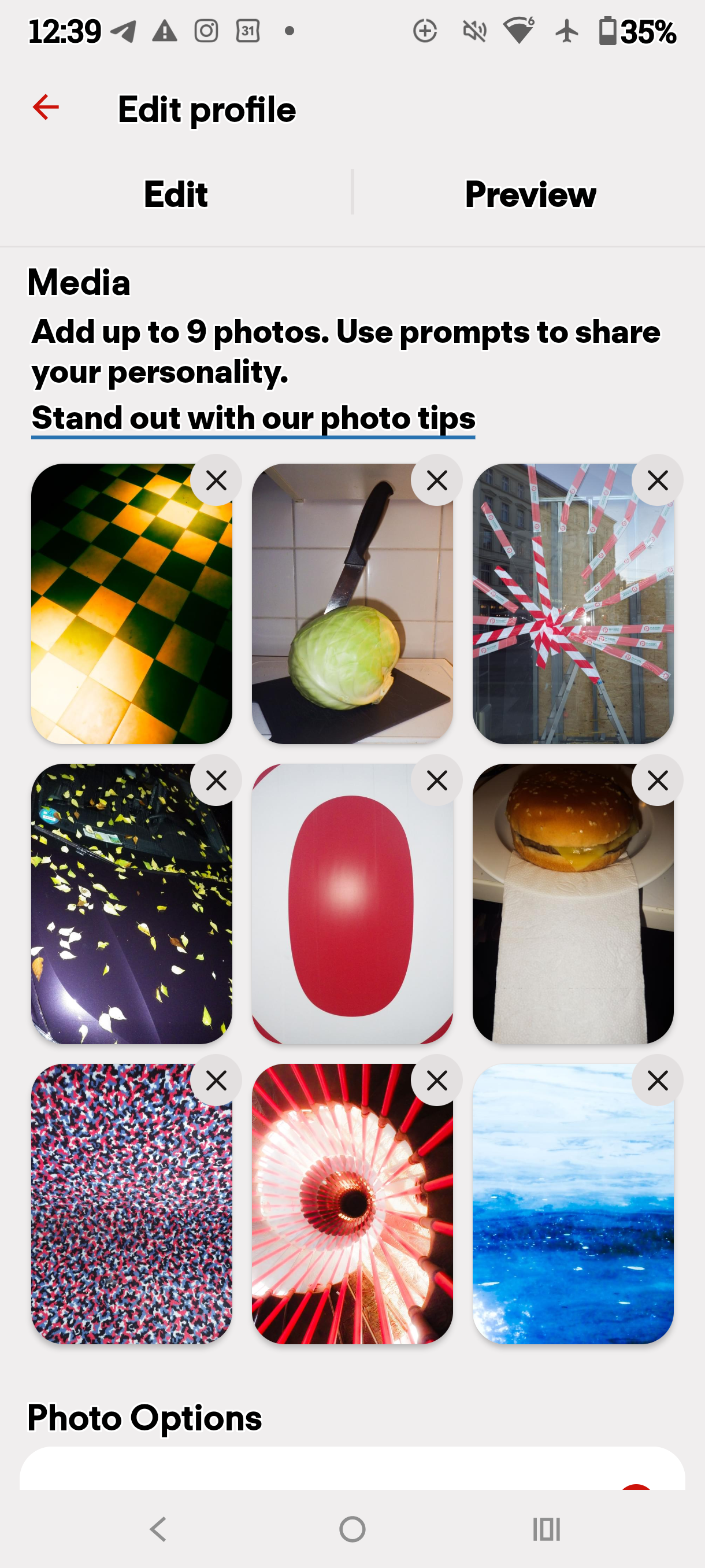 Tinder Exhibition profile editor showing a grid of nine photographs
