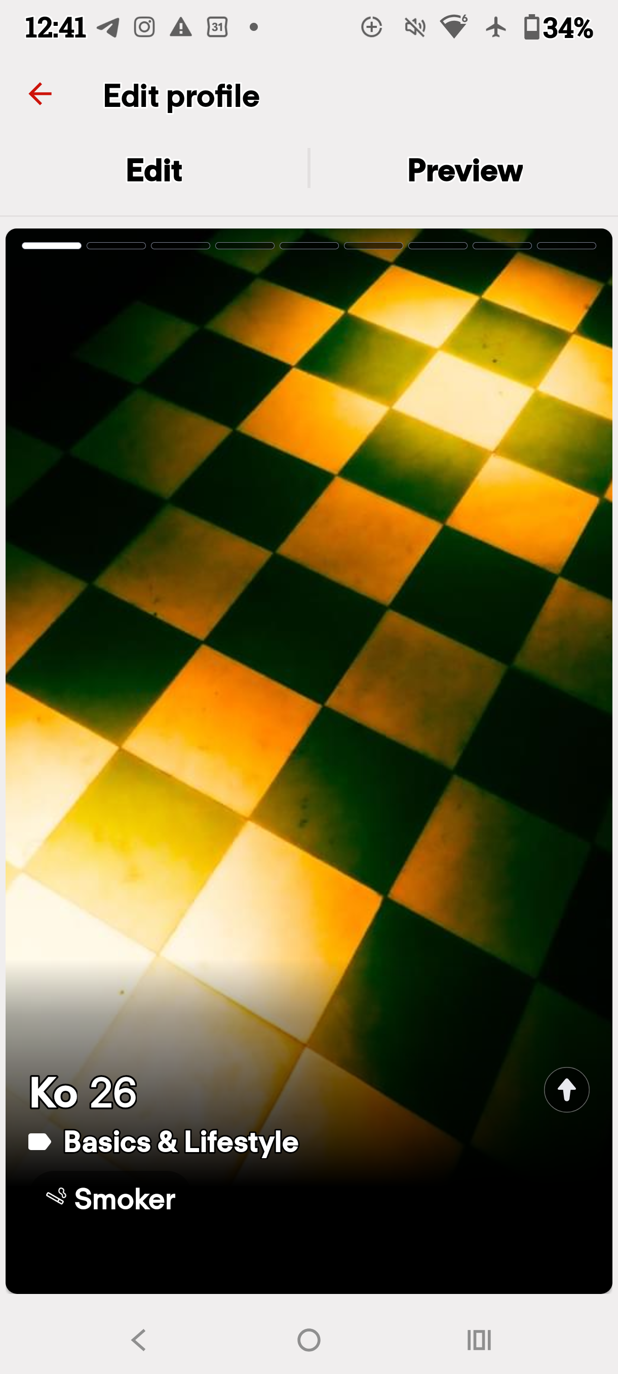 Dating profile preview displaying a yellow and green checkerboard photograph