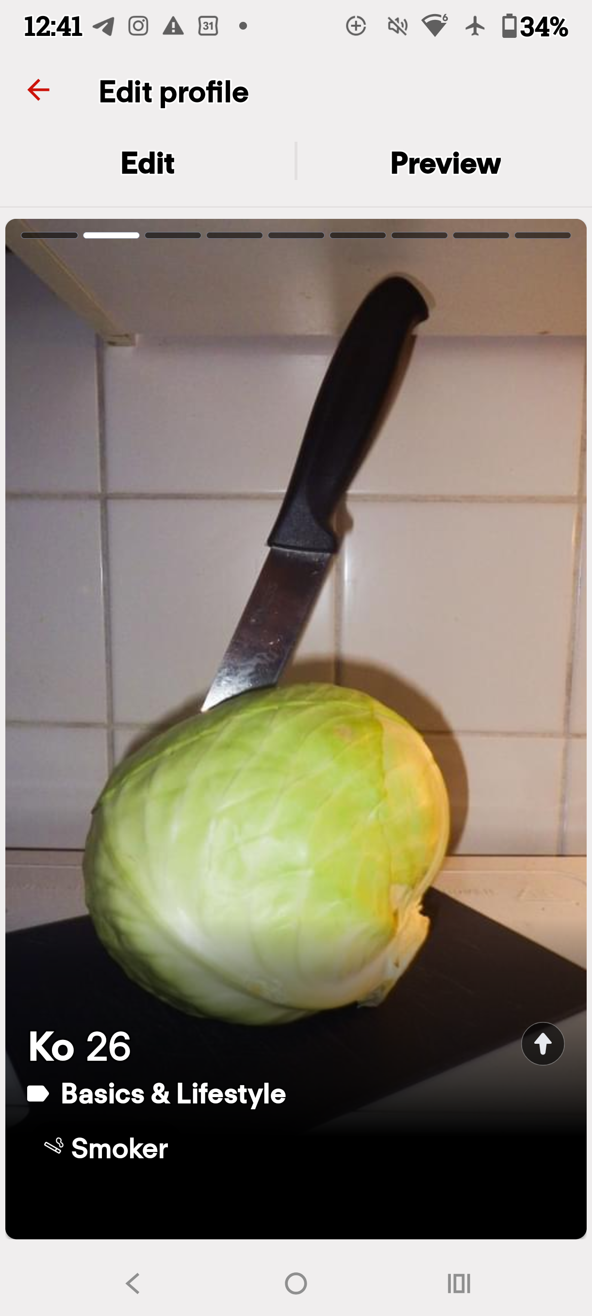 Dating profile preview displaying a knife placed in a cabbage