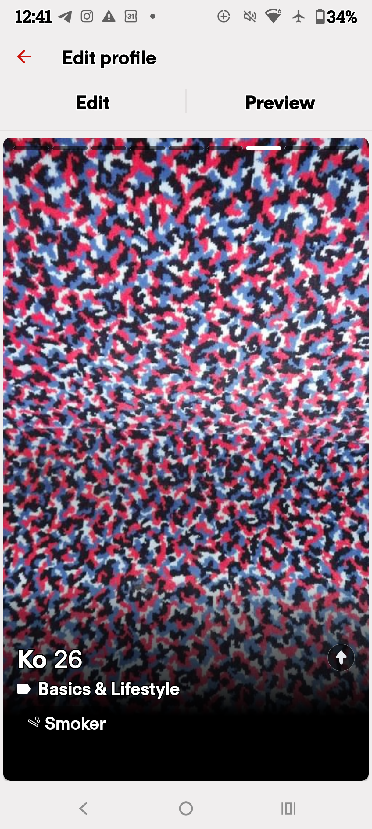 Dating profile preview displaying a dense red white blue and black pattern