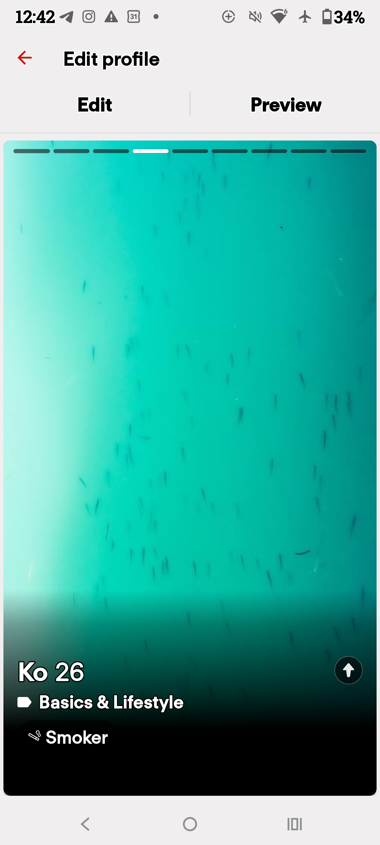 Dating profile preview displaying a turquoise abstract surface